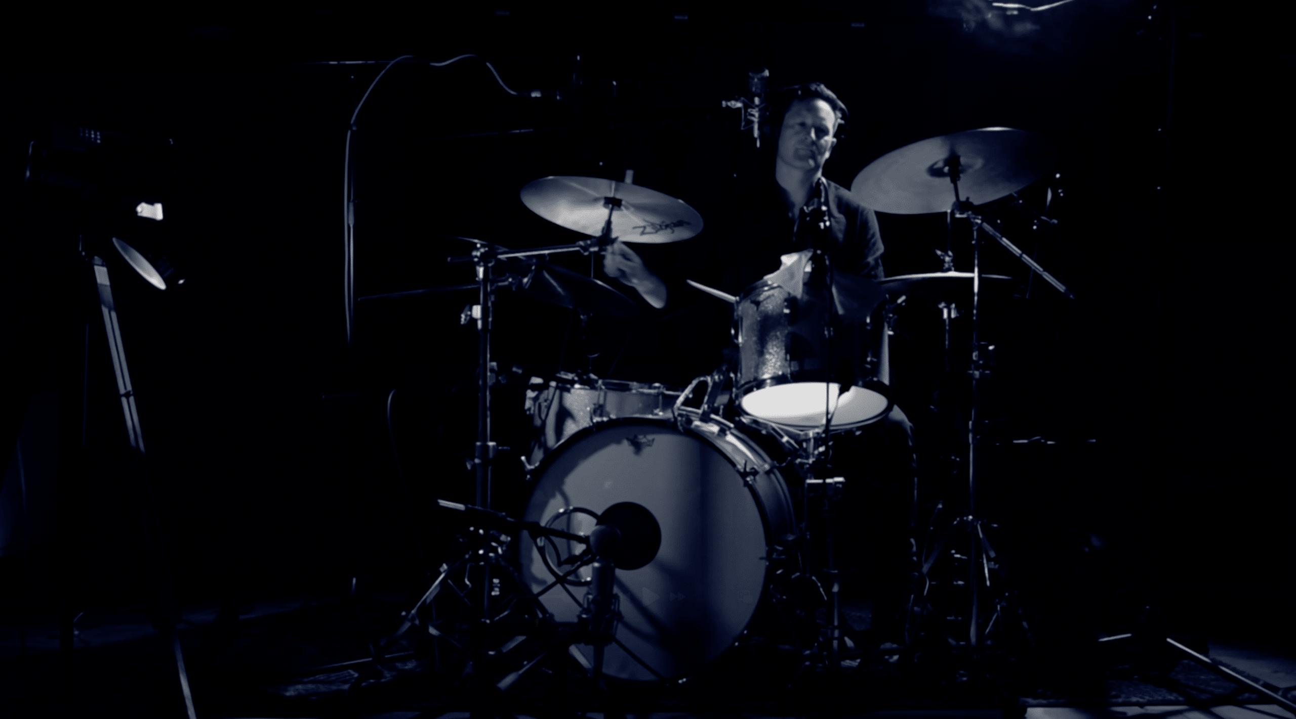 Gavin playing drums. Front shot recording remote drums